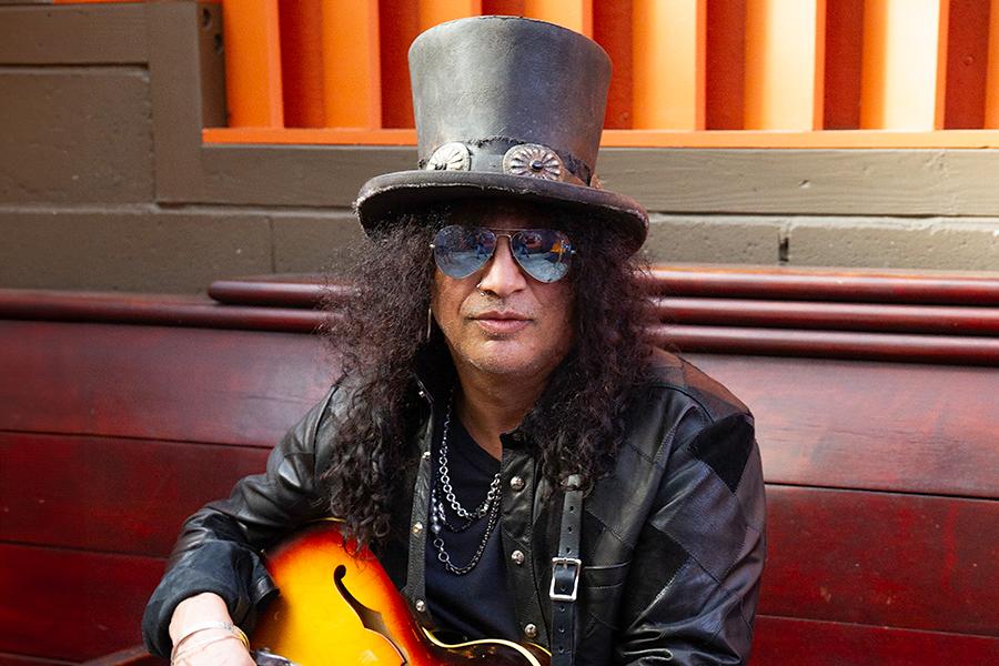 a photo of rocker slash with his signature top hat